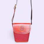 More than an everyday accessory, the Handcrafted Ajrakh Leather Sling Bag celebrates the beauty of Indian craftsmanship through a modern and versatile design. The combination of leather and Ajrakh-inspired artistry makes it a distinctive addition to any wardrobe. Carry the timeless spirit of Indian craftsmanship wherever you go with this beautifully handcrafted Ajrakh leather sling bag.